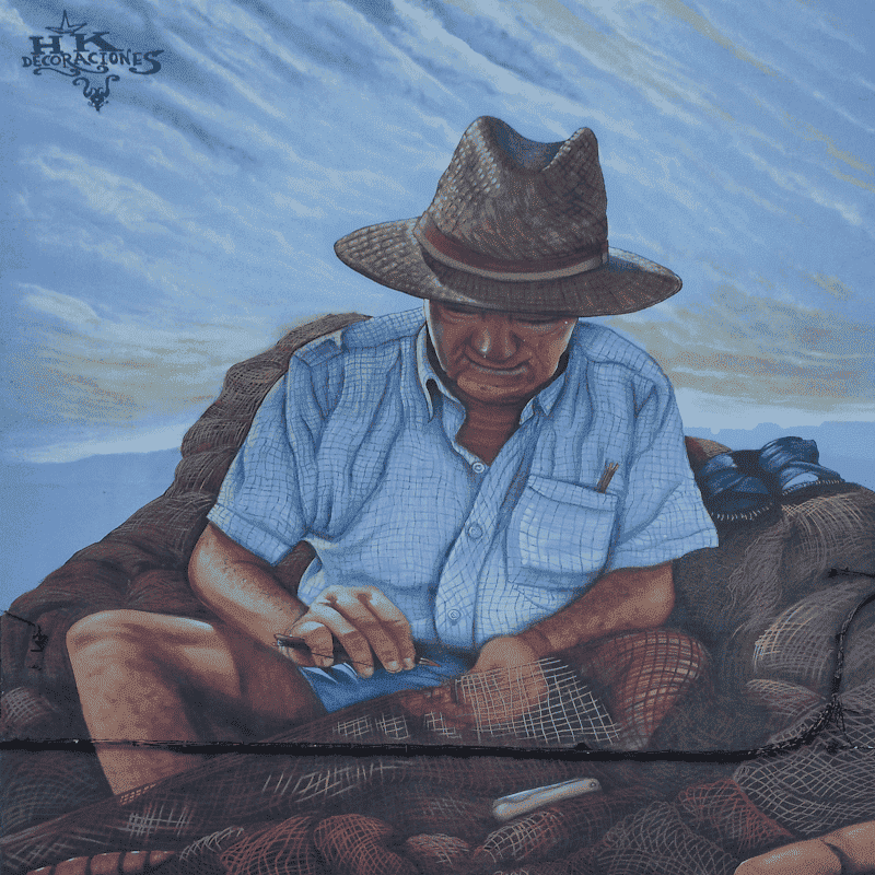Detalle de pintura mural en un edificio de Barbate